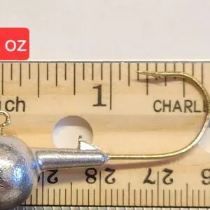 A fishing hook is shown next to a measuring tape.