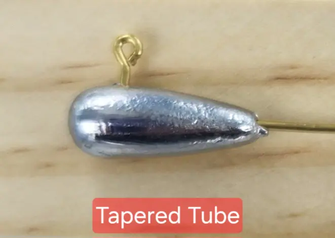 A silver metal object with the words tapered tube underneath it.