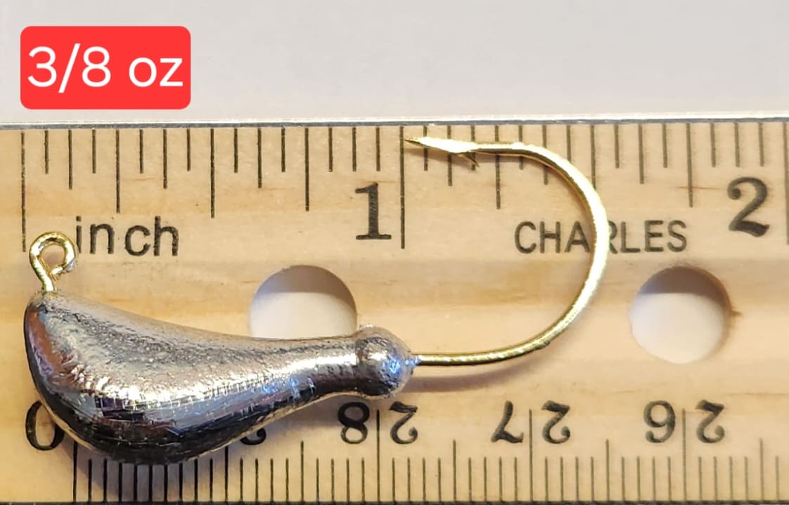 A fishing hook is shown on the scale.