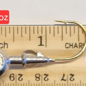 A fishing hook is shown on the scale.