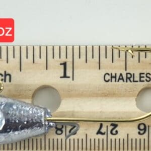 A fishing hook is shown next to a ruler.