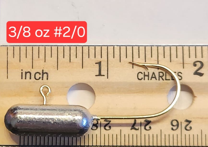 A fishing hook is shown on the ruler.