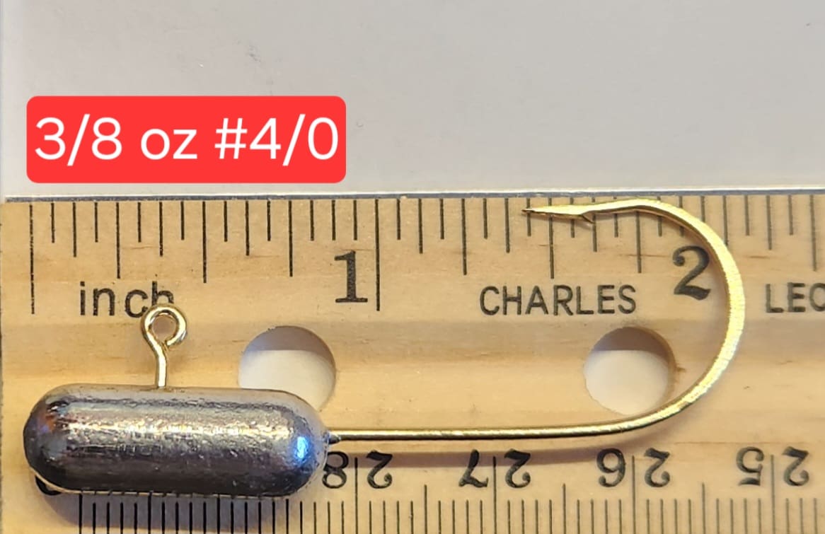 A metal hook is shown next to a ruler.