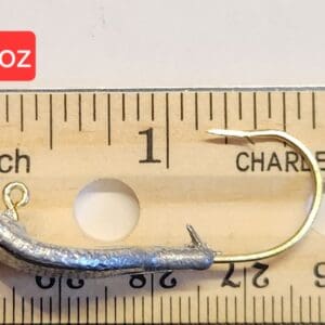 A fishing hook is shown on the ruler.