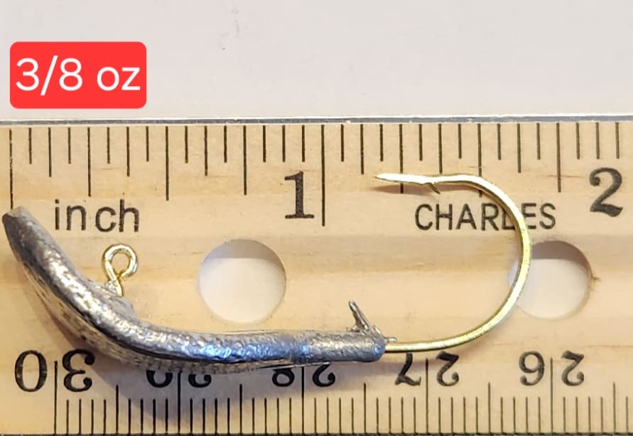 A fishing hook is shown on the ruler.